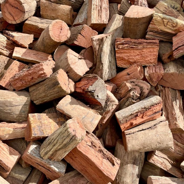 A pile of split firewood logs