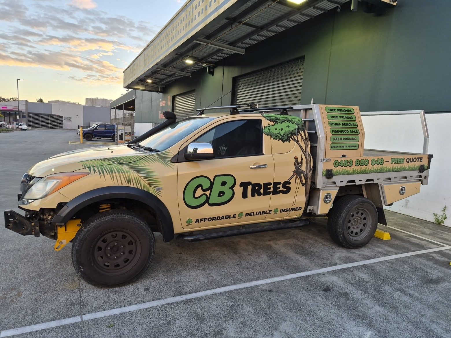The CB Trees work ute with the tree climber wrap